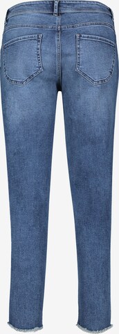 Coupe slim Jean Cartoon en bleu