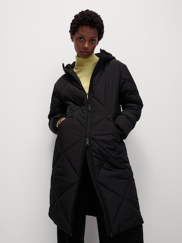 Marks & Spencer Winter Coat in Black: front