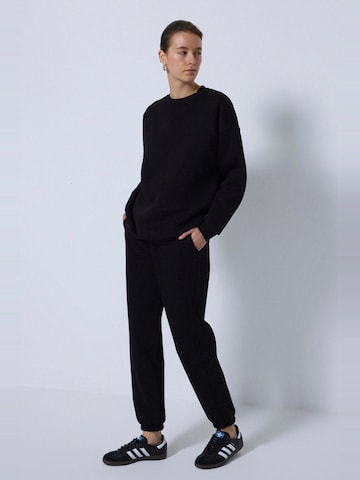 Touche Prive Sweatsuit in Black