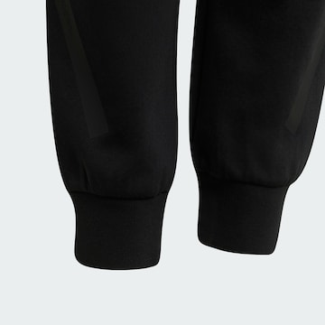 ADIDAS PERFORMANCE Tapered Παντελόνι φόρμας 'Messi' σε μαύρο