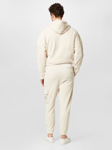 Calvin Klein Jeans Alt kitsenev Klapptaskutega püksid, värv beež