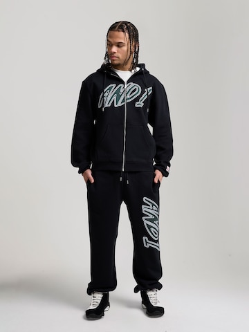 AND1 Конический (Tapered) Штаны 'Staple Graphic' в Черный