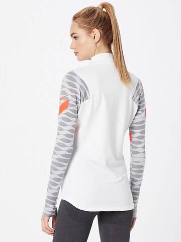 NIKE - Camiseta funcional 'Strike' en blanco