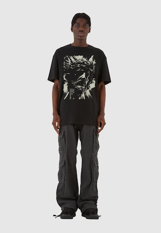 MJ Gonzales T-Shirt  'JESUS' in Schwarz