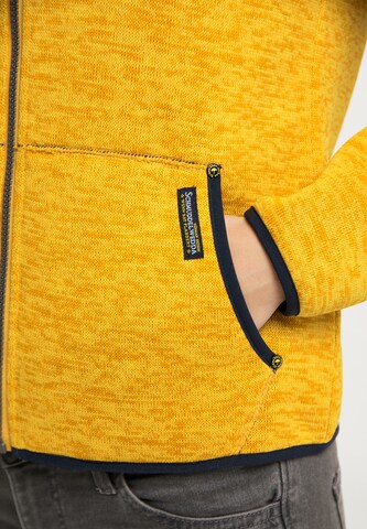 Manteau fonctionnel Schmuddelwedda en jaune