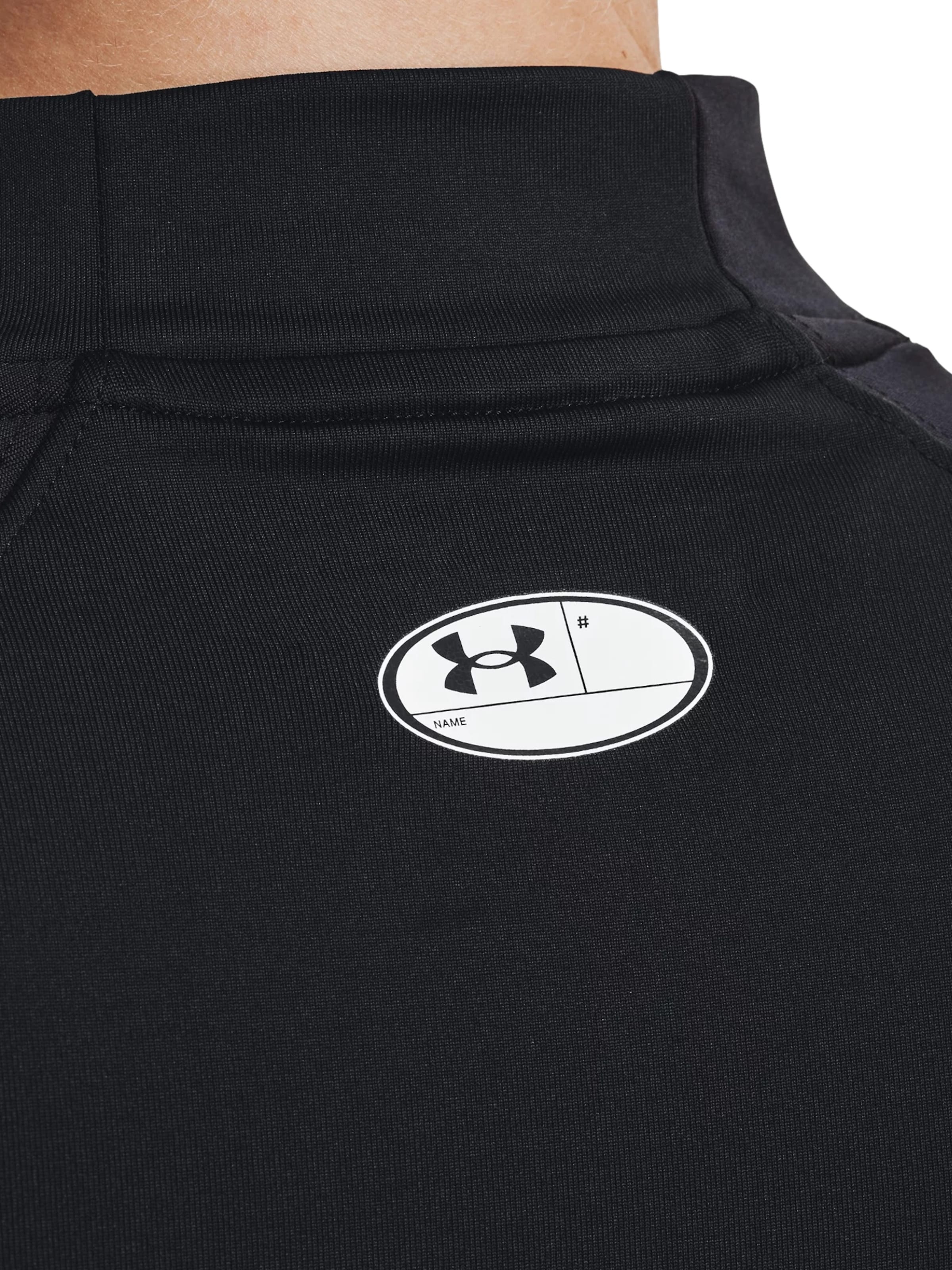 Maglietta di UNDER ARMOUR in nero