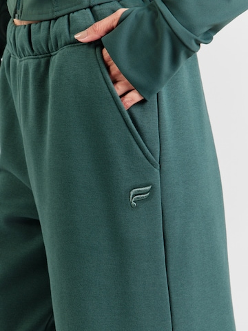 Fabletics - Perna larga Calças de desporto em verde