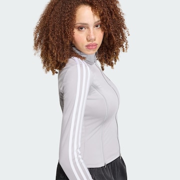 ADIDAS ORIGINALS - Sudadera con cremallera en gris