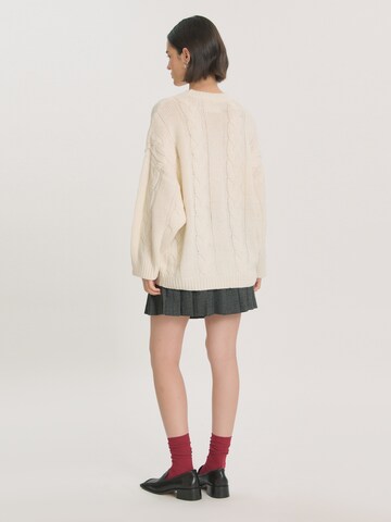 EDITED Sweater 'Camellia' in Beige