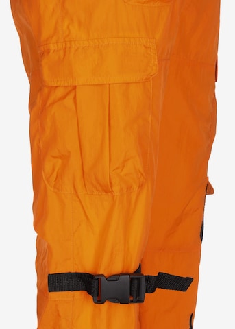 Karl Kani Loosefit Cargobroek in Oranje