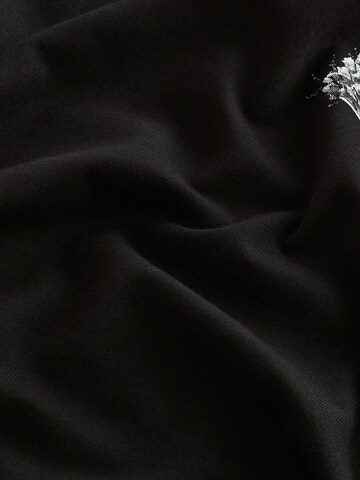 T-Shirt Next en noir