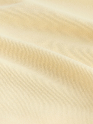 Next - Top deportivo 'Active' en amarillo