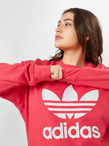 ADIDAS ORIGINALS Sweatshirt i röd