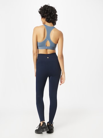 Athlecia Skinny Spodnie sportowe 'Balance' w kolorze niebieski