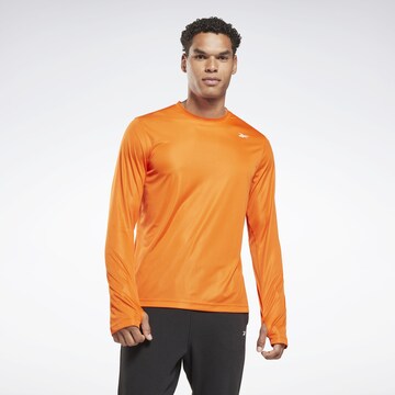 Reebok Funkční tričko – oranžová: přední strana