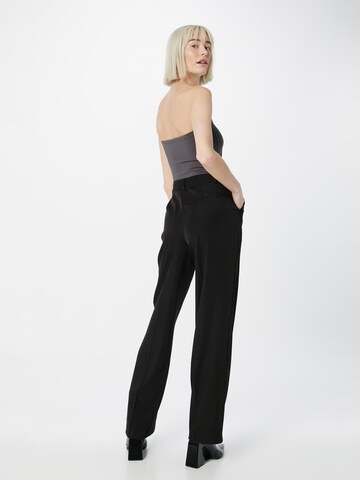 NA-KD Boot cut Trousers with creases in Black