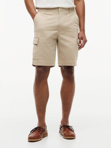 Loosefit Pantalon cargo TOMMY HILFIGER en beige : devant