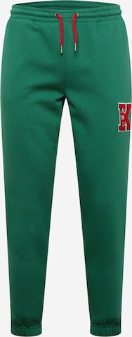 Urban Classics Zwężane Spodnie w kolorze zielony: przód