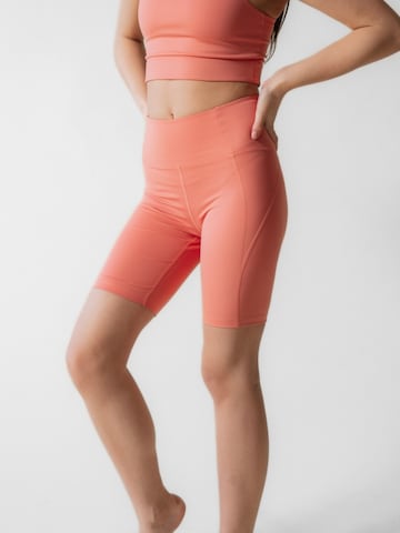 Skinny Leggings Girlfriend Collective en rose : devant