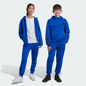 ADIDAS SPORTSWEAR Tapered Sports trousers in Blue: front
