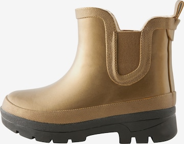 Bottes en caoutchouc Next en or : devant