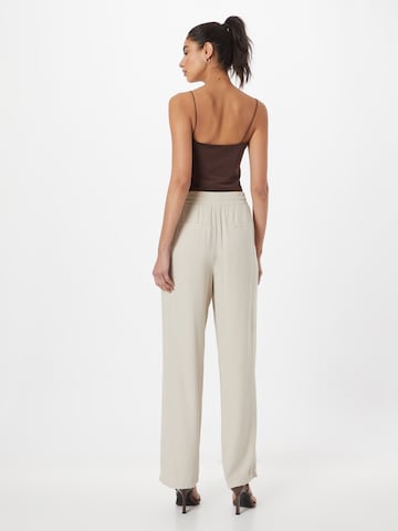 Loosefit Pantalon à pince 'JESMILO' VERO MODA en beige