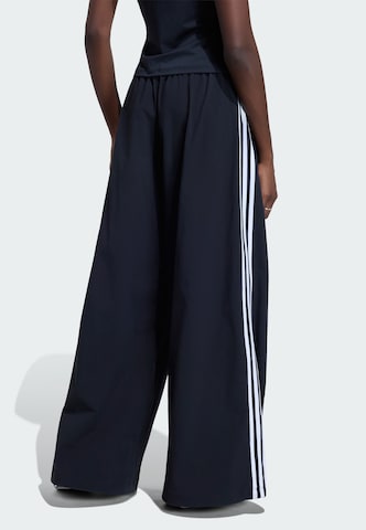 ADIDAS ORIGINALS - Pierna ancha Pantalón deportivo 'Adilenium 5.0' en negro