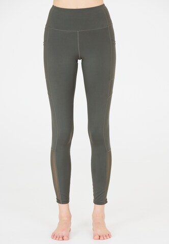 Athlecia Skinny Sportbroek 'Elli' in Groen: voorkant