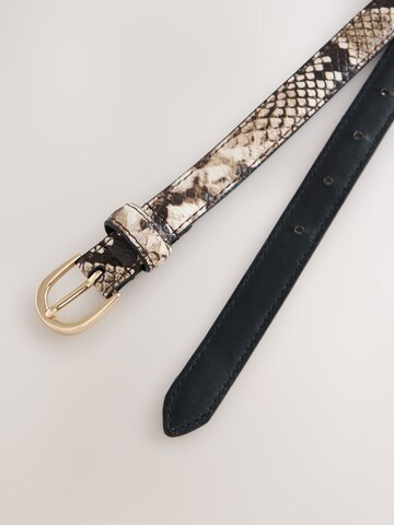 Next - Cinturón en beige