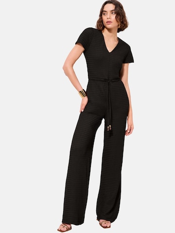 melns Friends Like These Kombinezons: no priekšpuses