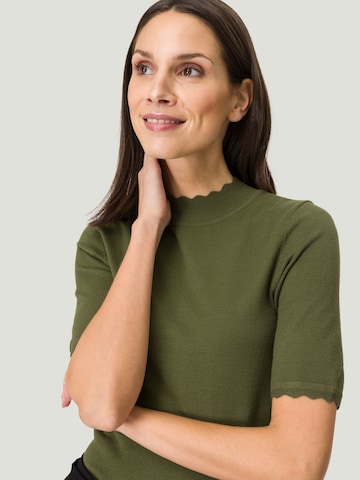 Pullover di zero in verde