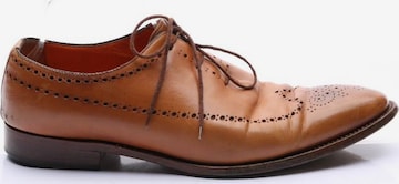 Santoni Flats & Loafers in 43 in Brown: front