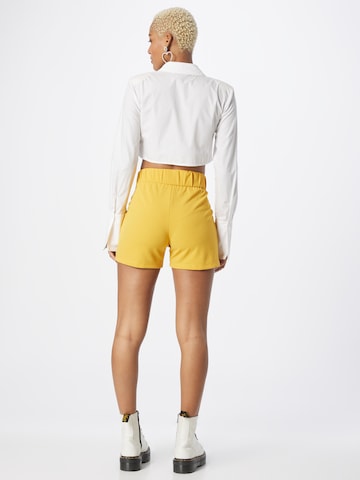 regular Pantaloni con pieghe 'GEGGO' di JDY in giallo