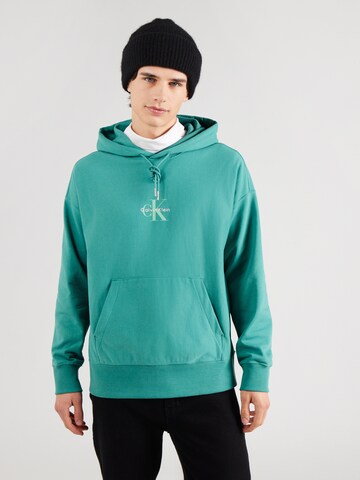 Calvin Klein Jeans Sweatshirt i grön: framsida