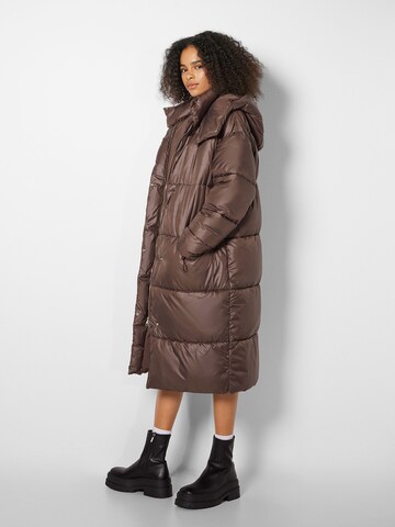 Bershka Winter Coat in Brown: front