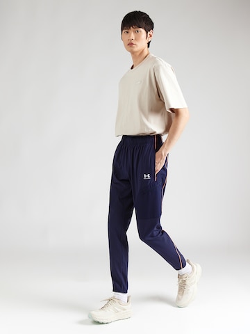 UNDER ARMOUR Normalny krój Spodnie sportowe 'Challenger' w kolorze niebieski