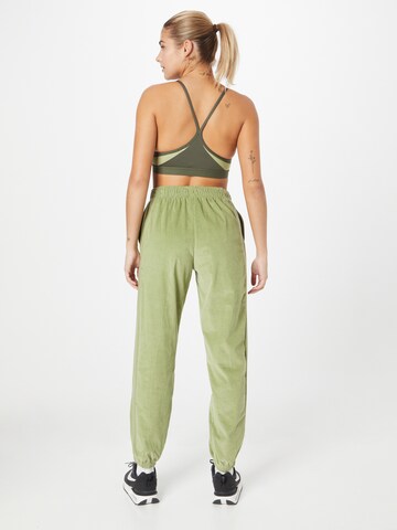 Effilé Pantalon Nike Sportswear en vert