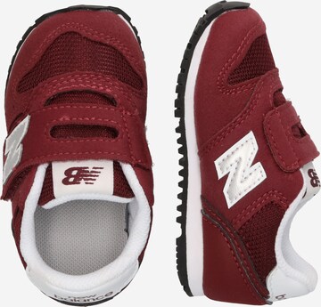 Baskets '373' new balance en rouge