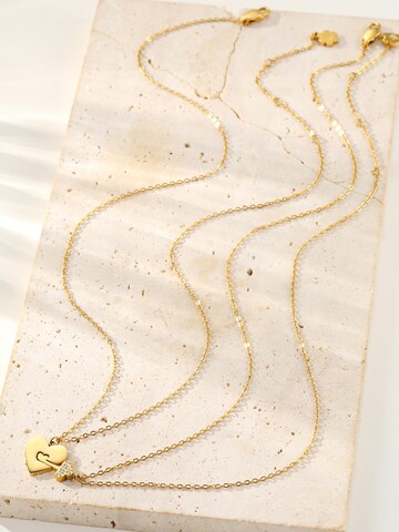 Collana 'Interlocking Heart & Key Love' di Hey Happiness in oro