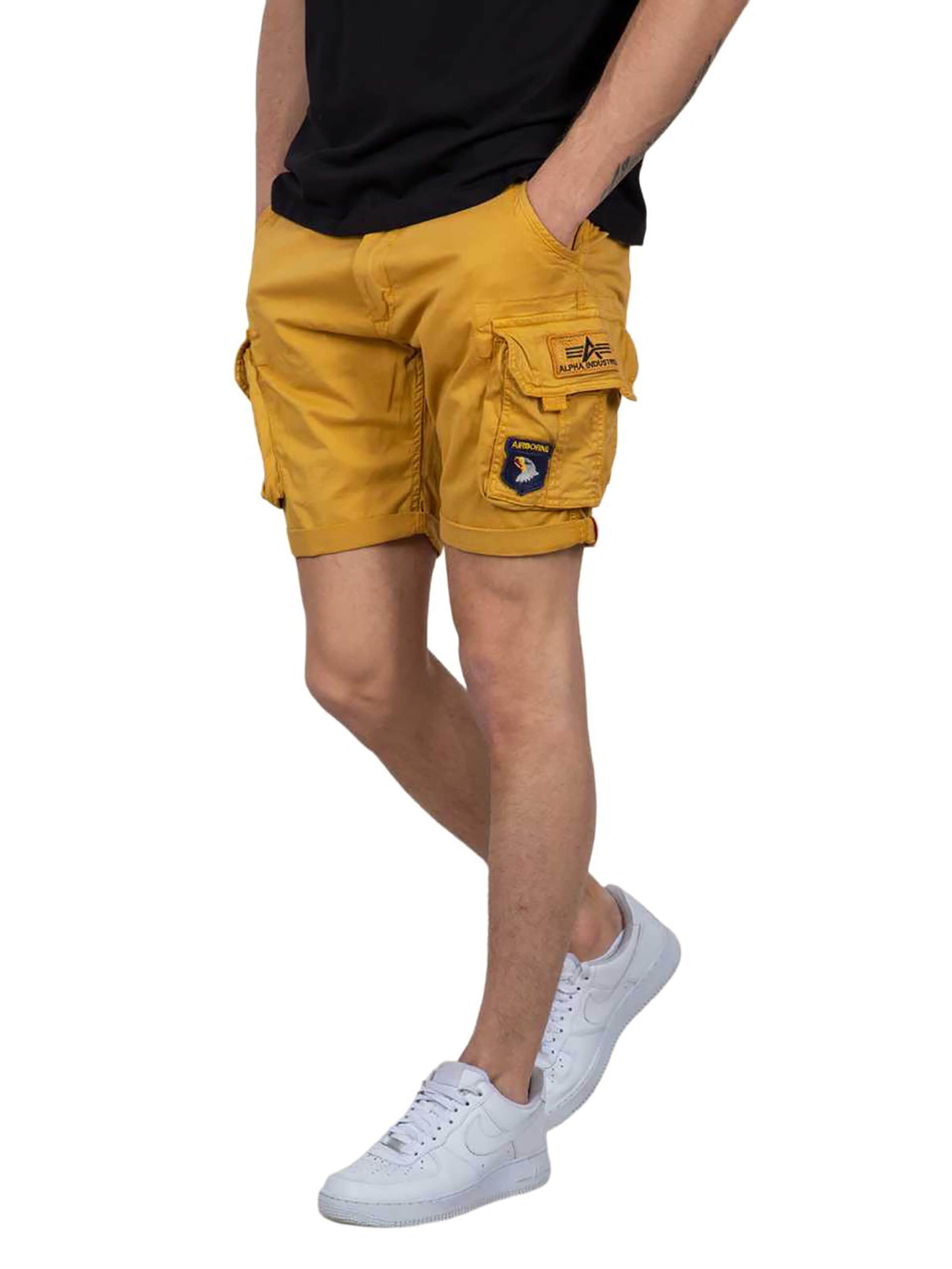 Coupe slim Pantalon cargo ALPHA INDUSTRIES en jaune