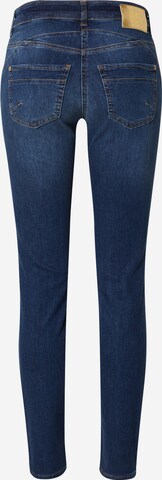 Skinny Jeans de la MAC pe albastru