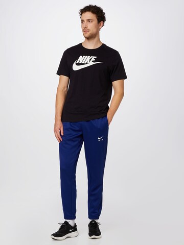 Nike Sportswear Tapered Broek in Blauw