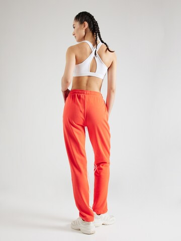 Regular Pantaloni sport 'Dance All-gender Versatile French Terry' de la ADIDAS SPORTSWEAR pe roșu