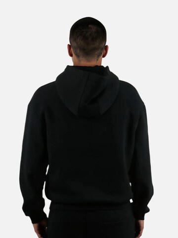 HEFTYKA Zip-Up Hoodie in Black