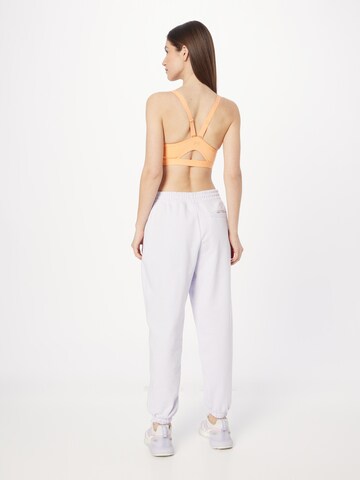 new balance Loosefit Broek in Lila