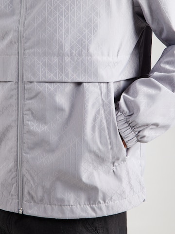 Veste mi-saison Calvin Klein Jeans en gris