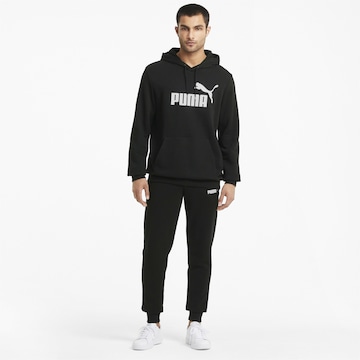 PUMA Sportsweatshirt 'Essentials' in Zwart