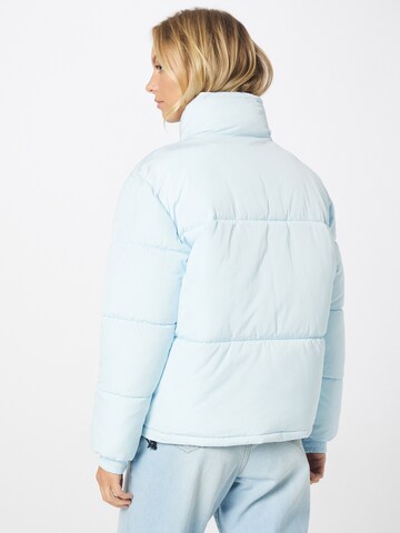 Veste d’hiver 'Retro Reversible' Karl Kani en bleu