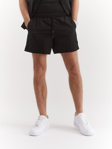 NCO Board Shorts in Black: front
