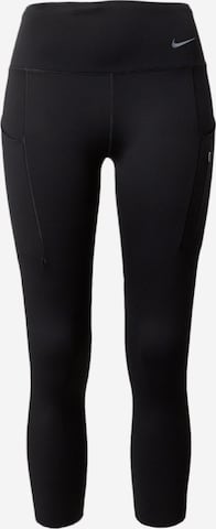 NIKE Skinny Workout Pants in Black: front